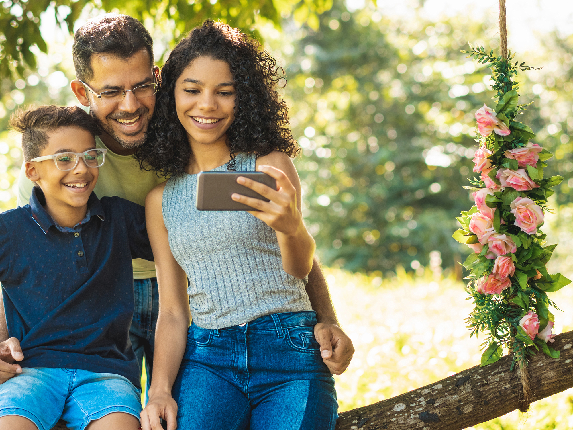 Father and Children on Phone