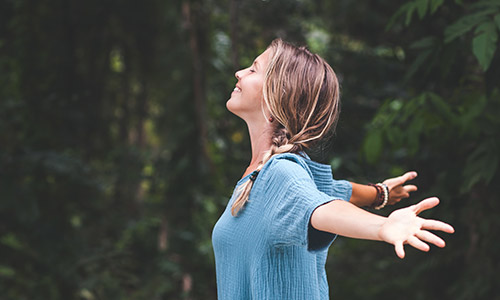 Woman breathing fresh air